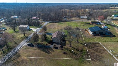 Welcome to 91 Thorn Drive, where country living meets lake - photo 3