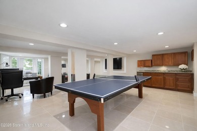 This builder's own home sits proudly atop a hill overlooking - photo 33