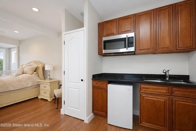 This builder's own home sits proudly atop a hill overlooking - photo 44