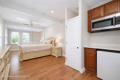 This builder's own home sits proudly atop a hill overlooking - photo 45