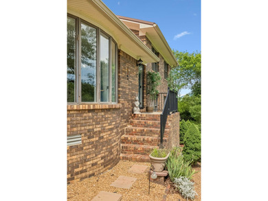 Spacious and versatile 4 bdr, 2.5 bath brick home situated on - photo 3