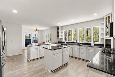 Situated on 1.13 acres with 150 feet of waterfront on the canal - photo 7
