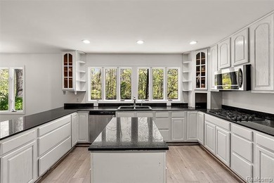 Situated on 1.13 acres with 150 feet of waterfront on the canal - photo 8