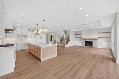 Experience luxury living in this custom-built two-story home by - photo 11