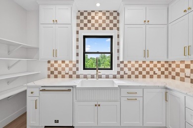 Experience luxury living in this custom-built two-story home by - photo 13
