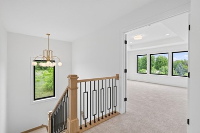 Experience luxury living in this custom-built two-story home by - photo 15
