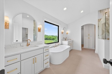Experience luxury living in this custom-built two-story home by - photo 19