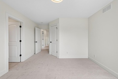Experience luxury living in this custom-built two-story home by - photo 25