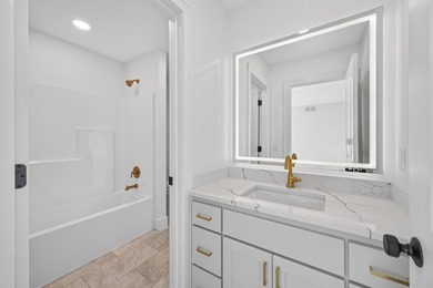 Experience luxury living in this custom-built two-story home by - photo 26