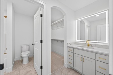 Experience luxury living in this custom-built two-story home by - photo 30