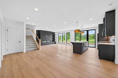 Experience luxury living in this custom-built two-story home by - photo 31