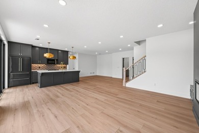 Experience luxury living in this custom-built two-story home by - photo 33
