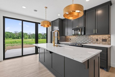 Experience luxury living in this custom-built two-story home by - photo 34