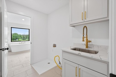 Experience luxury living in this custom-built two-story home by - photo 40