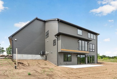 Experience luxury living in this custom-built two-story home by - photo 46