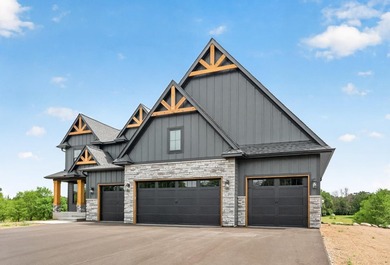 Experience luxury living in this custom-built two-story home by - photo 49