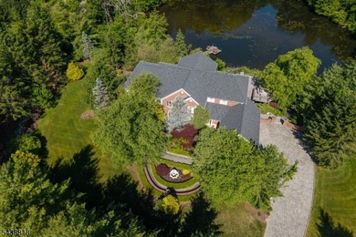 Set on nearly four private acres, this exceptional custom - photo 1