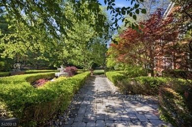 Set on nearly four private acres, this exceptional custom - photo 3