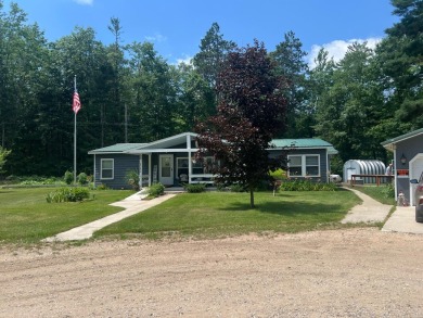 Lake Home For Sale in Frederic, Michigan