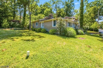 Welcome to 139 Mohawk Trail, a charming log cabin-style home - photo 3