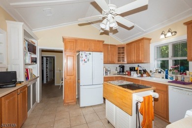 Welcome to 139 Mohawk Trail, a charming log cabin-style home - photo 4