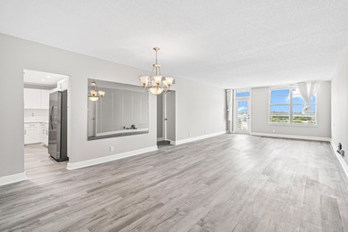 Welcome Home! This beautifully renovated, oversized condo is - photo 1