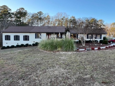 Spacious lake home on 2.9 acre lot with boat dock in place and - Lake Other For Sale in Manson, North Carolina