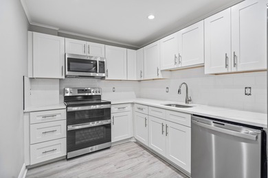 Welcome Home! This beautifully renovated, oversized condo is - photo 6