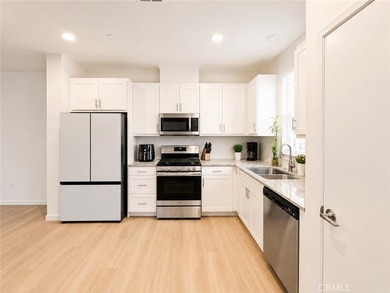 PRICE TO SELL WITH TONS OF UPGRADES! Experience modern living in - photo 3