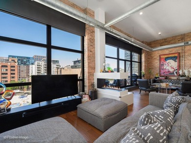SOARING CEILINGS. EXPOSED BRICK. TRUE WEST LOOP PENTHOUSE LIVING - photo 12