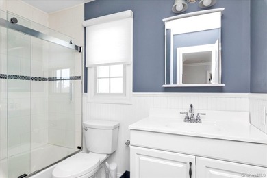 Welcome to this beautiful beachside Colonial located in the - photo 17