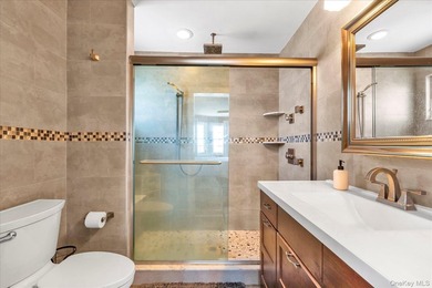 Welcome to this beautiful beachside Colonial located in the - photo 22