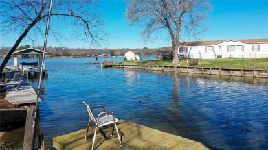 Lake house on cove just off open water and 2 lots from community - Lake Home For Sale in Mabank, Texas