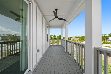 There is a certain energy to this stretch of Inlet Beach, where - photo 33