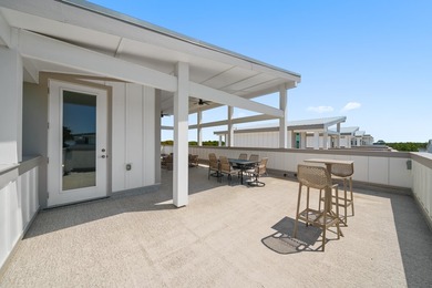 There is a certain energy to this stretch of Inlet Beach, where - photo 38