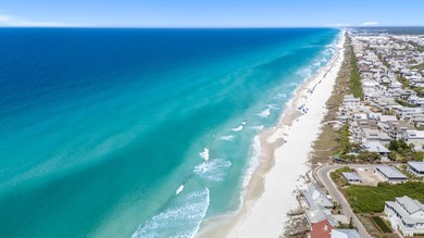There is a certain energy to this stretch of Inlet Beach, where - photo 45