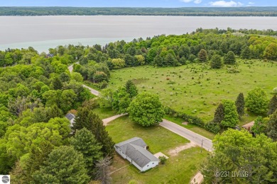 Lake Home For Sale in Rapid City, Michigan