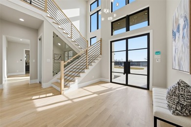 Located in a small, upscale gated community, this contemporary - photo 4
