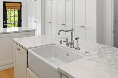 Experience refined coastal living in this fully remodeled beach - photo 18