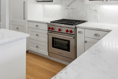 Experience refined coastal living in this fully remodeled beach - photo 19