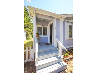 Nestled along the scenic Oregon Coast, this charming 2-bedroom - photo 3