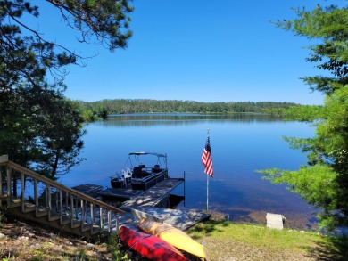 Lake Home For Sale in Hawks, Michigan