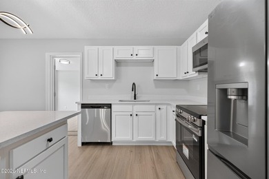 Completely renovated and move-in ready! This solid brick and - photo 15