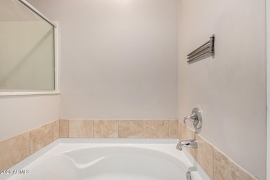 Discover this gorgeous fourth-floor condo in the desirable North