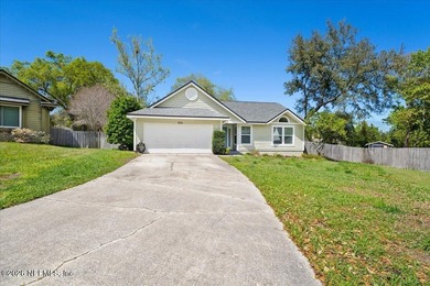 Tucked away at the end of a cul-de-sac, this River Point home - photo 3