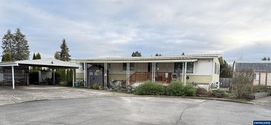 Nicely updated home w/new LVP flooring, metal roof, updated