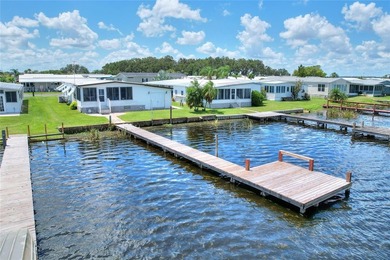 RARE OPPORTUNITY! TRUE LAKEFRONT with DOCK.  Ideal Central - photo 2