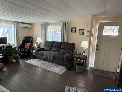 Nicely updated home w/new LVP flooring, metal roof, updated