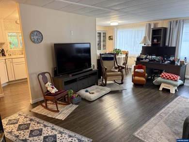 Nicely updated home w/new LVP flooring, metal roof, updated