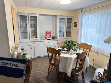 Nicely updated home w/new LVP flooring, metal roof, updated